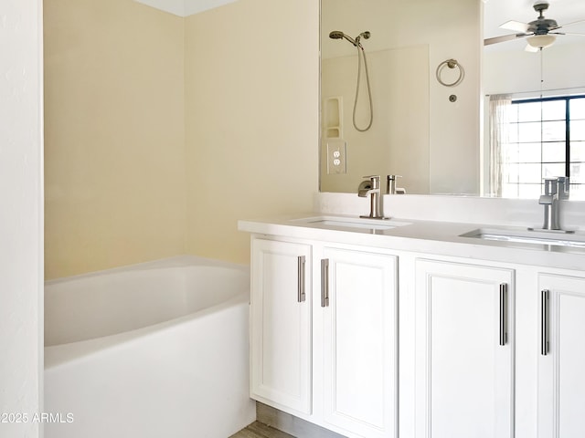 full bathroom with a sink, a tub to relax in, walk in shower, and double vanity