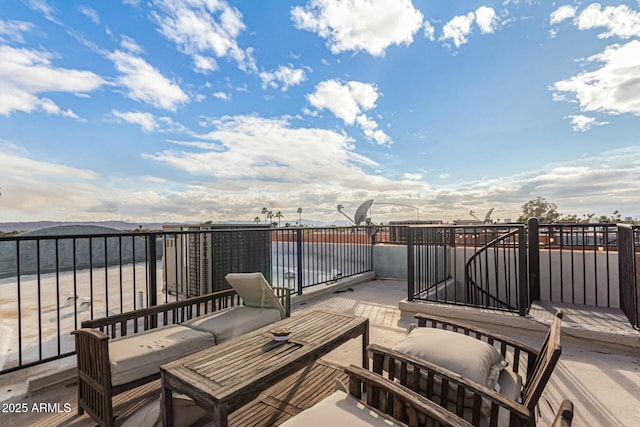 deck with a mountain view and an outdoor hangout area