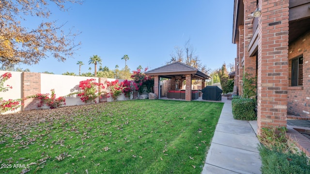 view of yard with a gazebo and outdoor lounge area