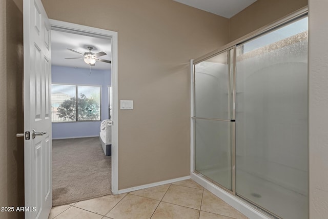 19667 N 260th Ln N, Buckeye, AZ 85396 - bathroom with an enclosed shower, tile patterned floors, ceiling fan, and baseboards