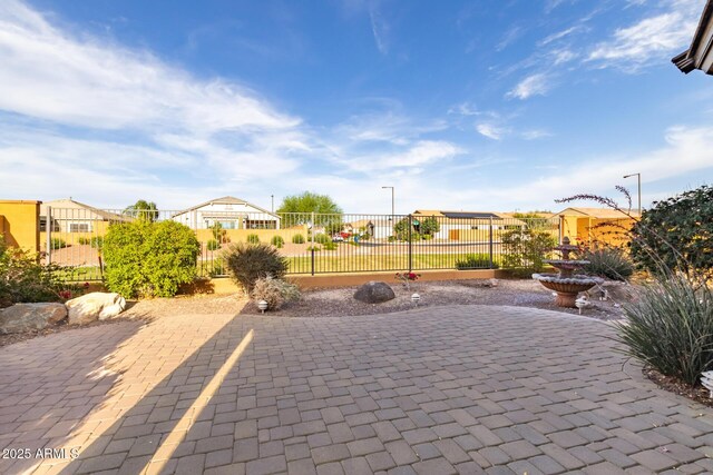 19667 N 260th Ln N, Buckeye, AZ 85396 - view of patio featuring a residential view