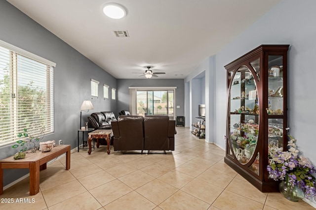 19667 N 260th Ln N, Buckeye, AZ 85396 - living room with light tile patterned flooring and ceiling fan
