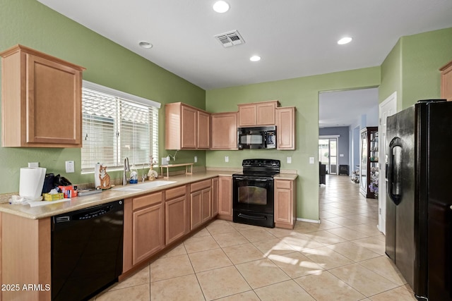 19667 N 260th Ln N, Buckeye, AZ 85396 - kitchen featuring black appliances, light countertops, recessed lighting, light brown cabinets, and light tile patterned flooring