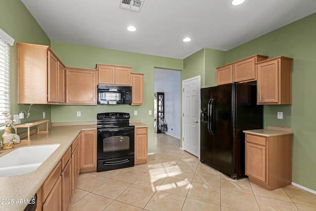 19667 N 260th Ln N, Buckeye, AZ 85396 - kitchen with black appliances, a sink, light brown cabinets, light countertops, and recessed lighting