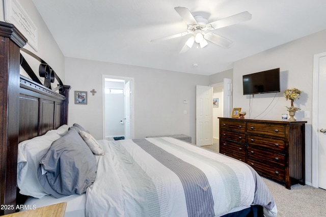 bedroom featuring light carpet and ceiling fan