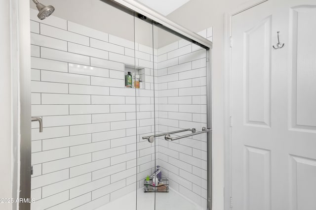 full bathroom featuring a shower stall