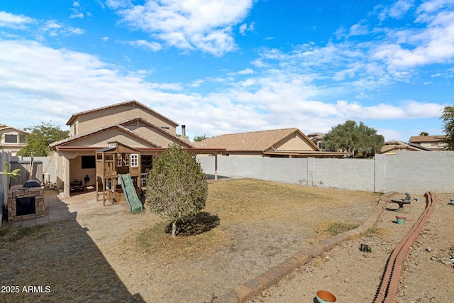 exterior space with a fenced backyard and a patio