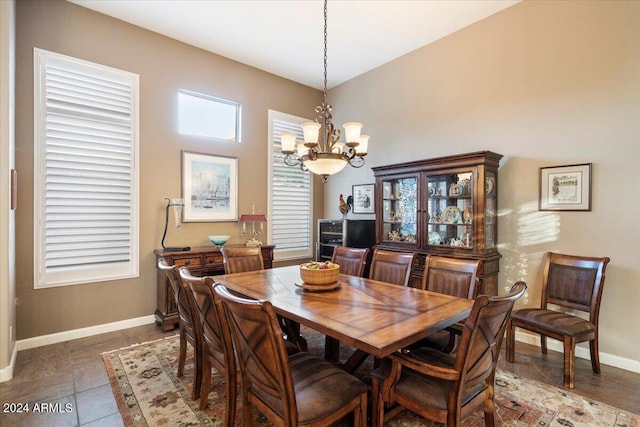 dining space featuring an inviting chandelier