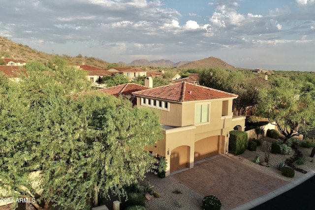 drone / aerial view featuring a mountain view