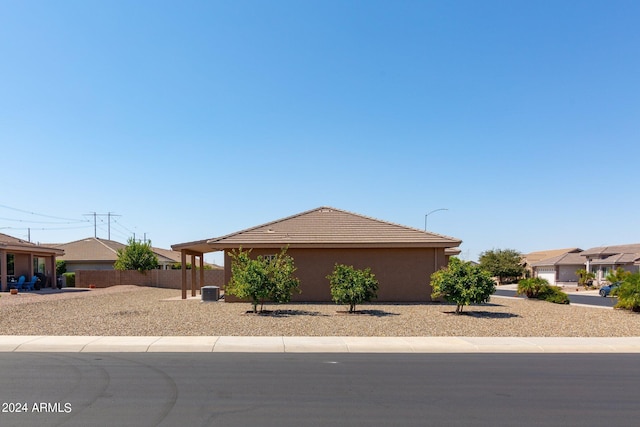 11235 E Pampa Ave, Mesa, AZ 85212 - view of front of property featuring stucco siding, a tiled roof, and central AC