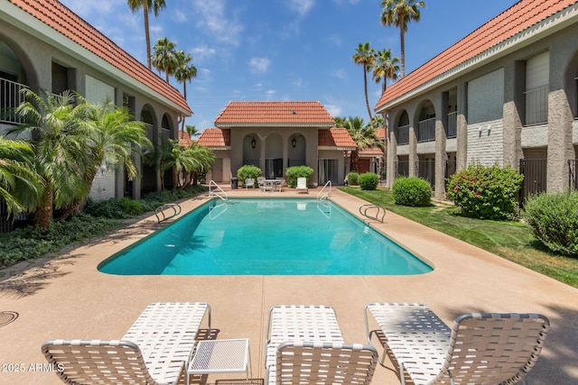 pool with a patio area