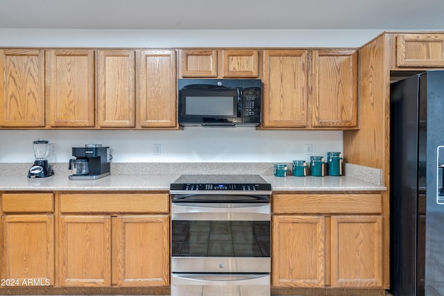 kitchen with black appliances