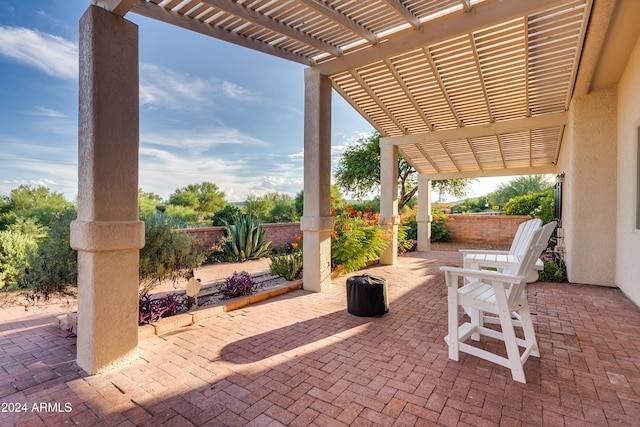 view of patio featuring a pergola