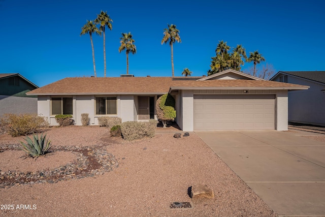 single story home featuring a garage