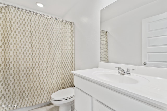 bathroom with vanity, a shower with curtain, tile patterned floors, and toilet