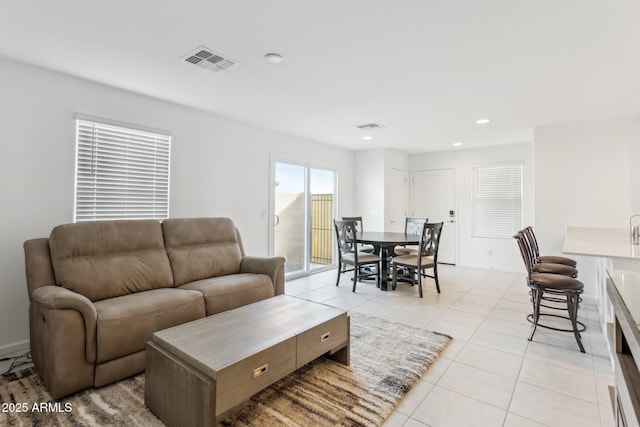 living room with light tile patterned flooring