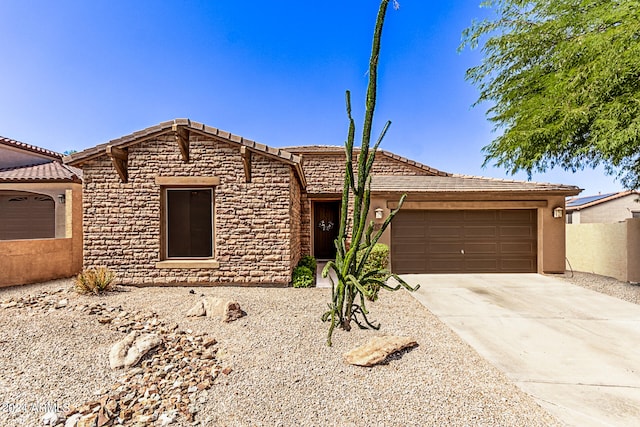 view of front of property featuring a garage