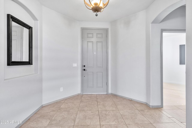 foyer featuring light tile patterned floors