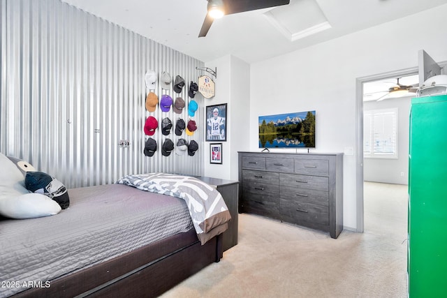 carpeted bedroom with ceiling fan