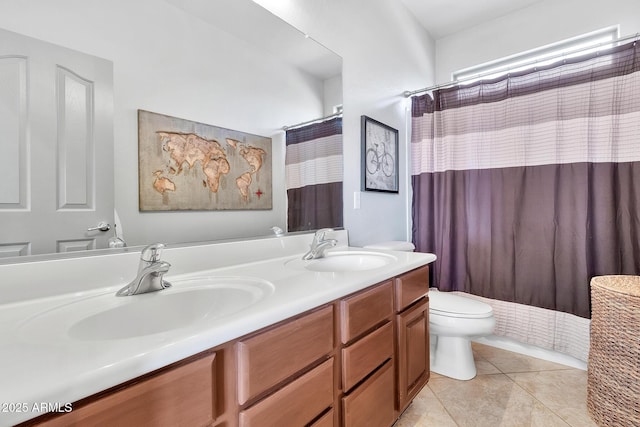 bathroom featuring a shower with curtain, vanity, toilet, and tile patterned flooring