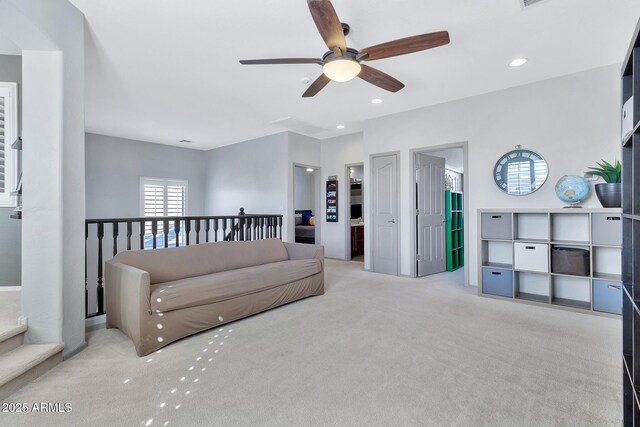 living room featuring light carpet