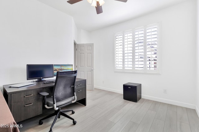 home office with ceiling fan and light wood-type flooring