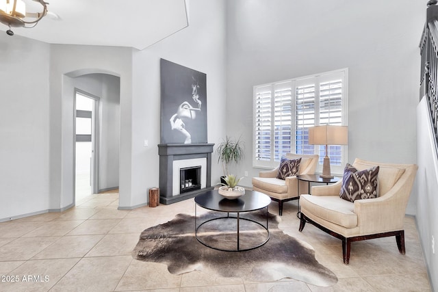 sitting room with light tile patterned floors