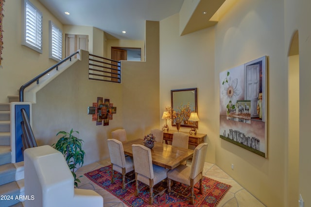 dining room with light tile patterned flooring