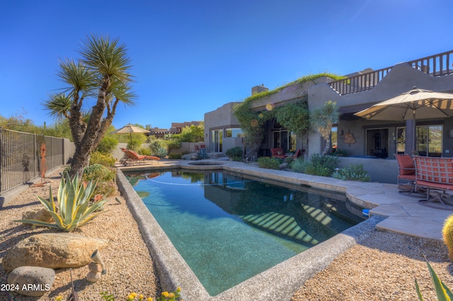 view of pool featuring a patio area