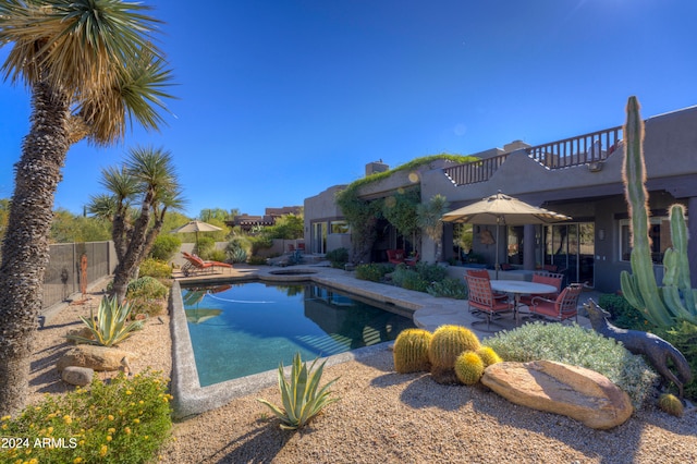 view of swimming pool with a patio area