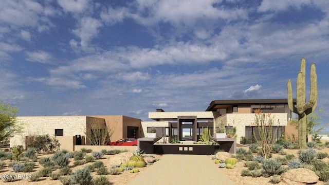 view of front of house with stone siding and stucco siding