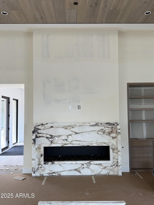 8167 E Leaning Rock Rd Unit 193, Scottsdale, AZ 85266 - details with wooden ceiling and a fireplace