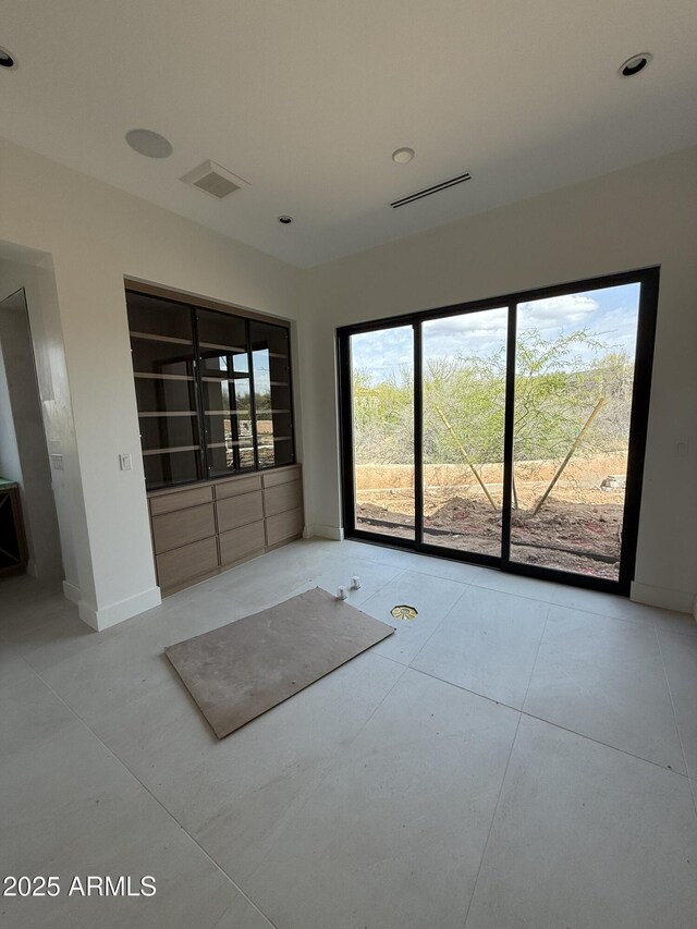 8167 E Leaning Rock Rd Unit 193, Scottsdale, AZ 85266 - spare room featuring visible vents and baseboards