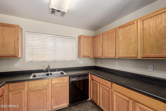 kitchen with black dishwasher, a sink, dark countertops, a textured ceiling, and light brown cabinets