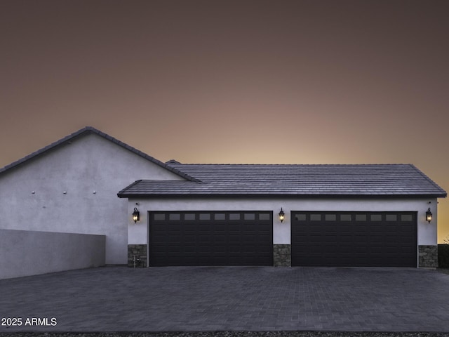 exterior space with decorative driveway