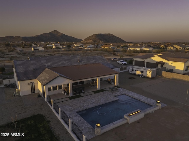 aerial view at dusk with a mountain view