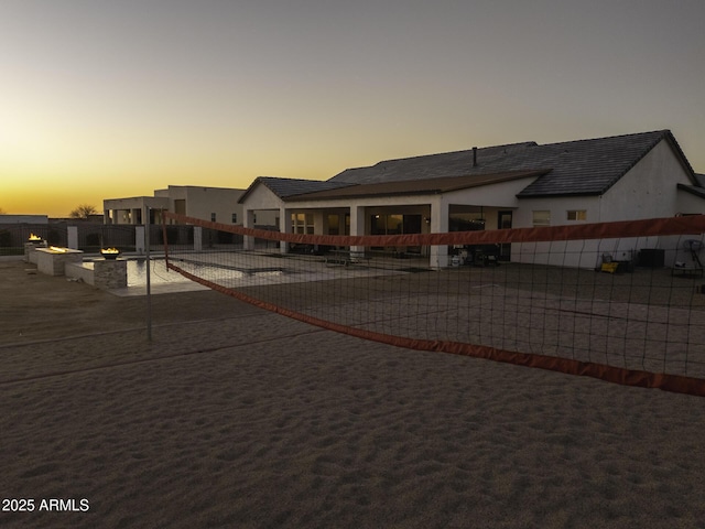 view of front of house with fence