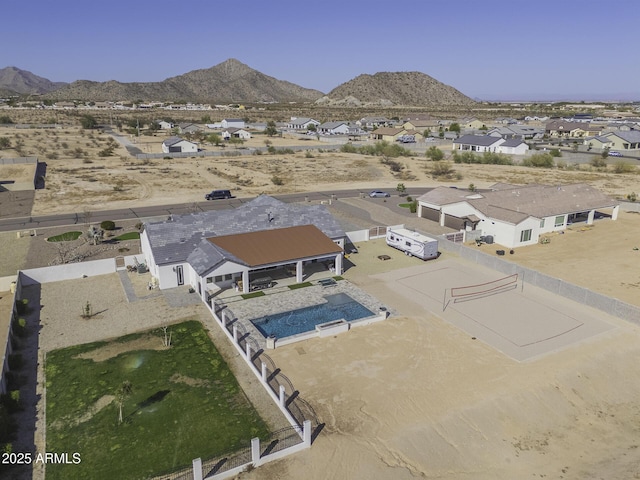 drone / aerial view with a residential view and a mountain view