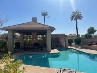 view of pool featuring a gazebo and a patio