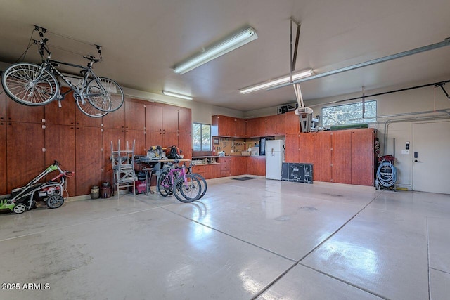 garage with white fridge