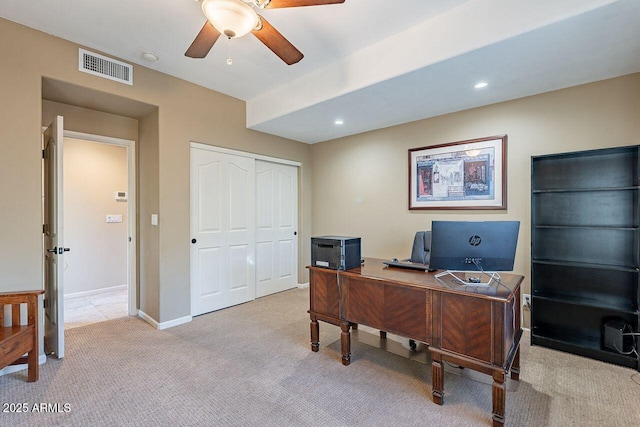 office area featuring light colored carpet and ceiling fan