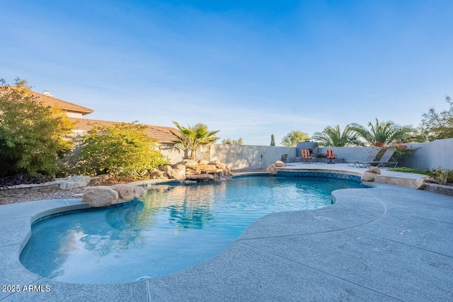 view of swimming pool with a patio