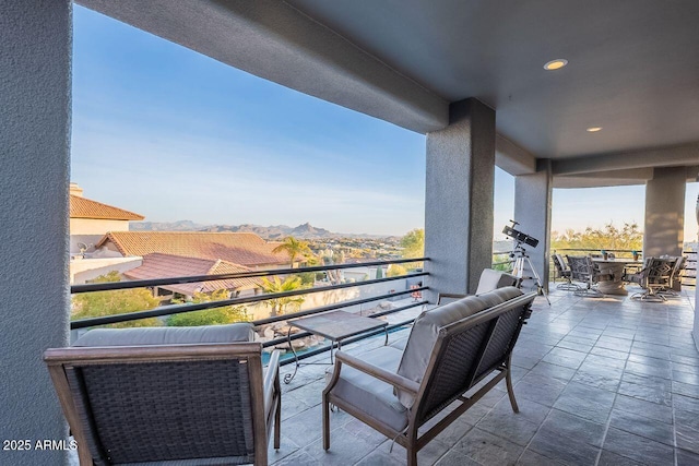 balcony featuring a mountain view