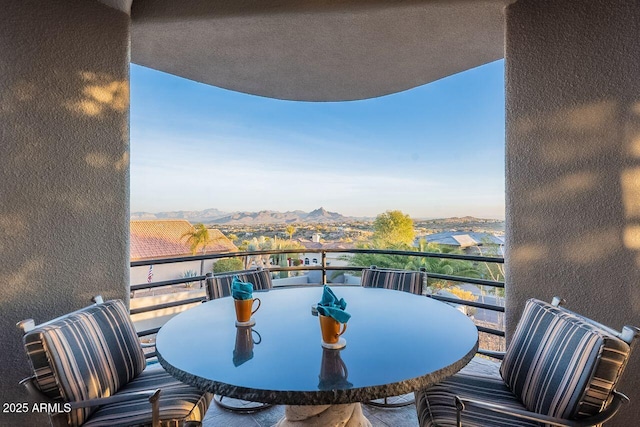 balcony featuring a mountain view