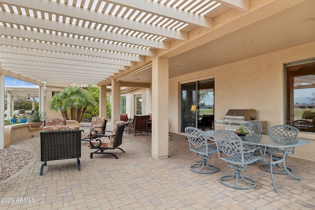 view of patio / terrace featuring outdoor dining area, a pergola, and a grill