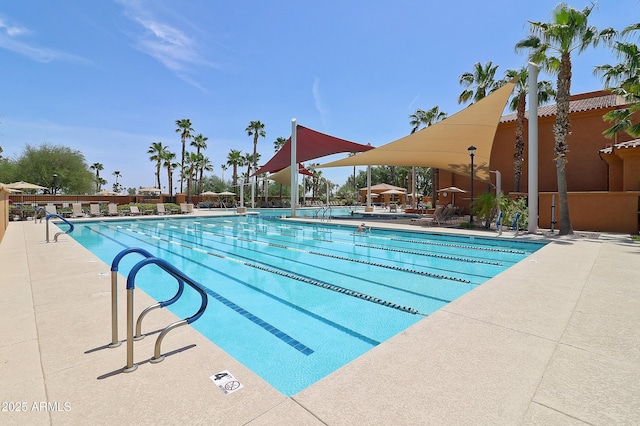 community pool with a patio