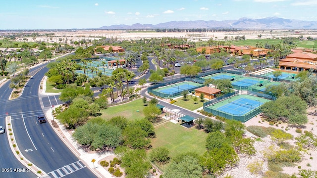 birds eye view of property with a mountain view