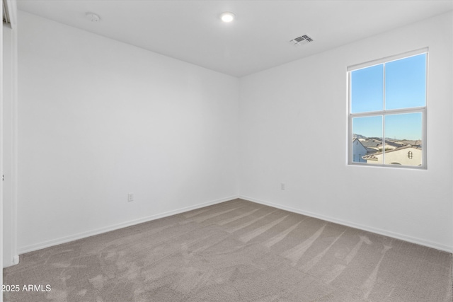 view of carpeted spare room