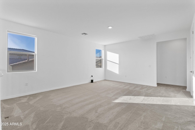 view of carpeted spare room