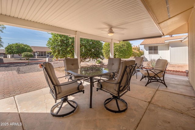 view of patio / terrace with outdoor dining space and ceiling fan